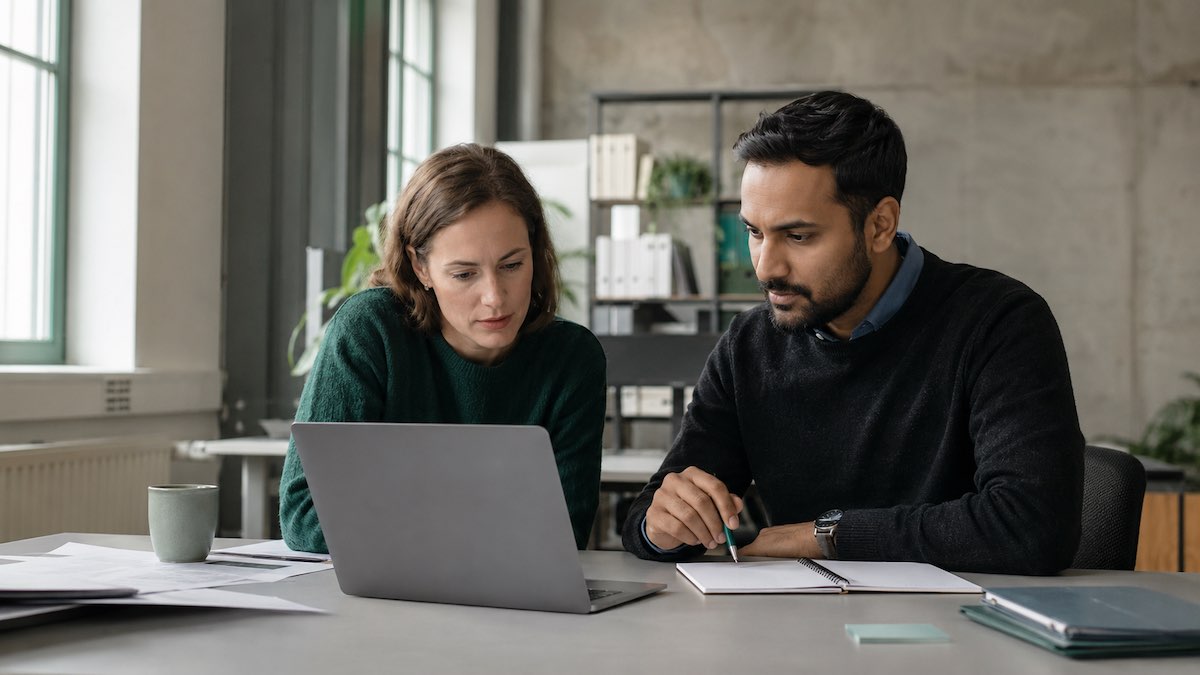Recruiter and technical professional reviewing salary expectations for jobs in Germany